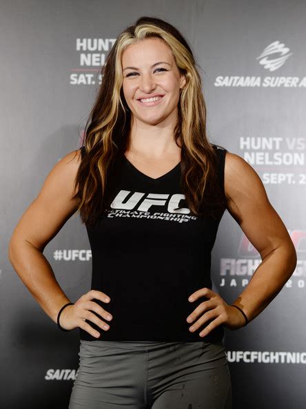 Tate gave birth on the bathroom floor of her home. Miesha Tate Pictures - UFC Tokyo Press Conference - Zimbio