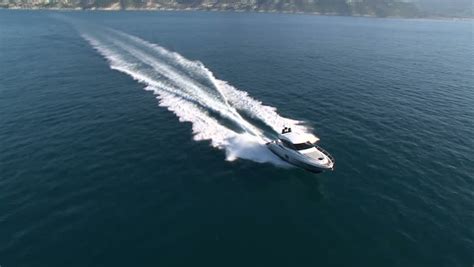 Aerial View Of Luxury Boat Navigating In The Sea At Full Speed Stock