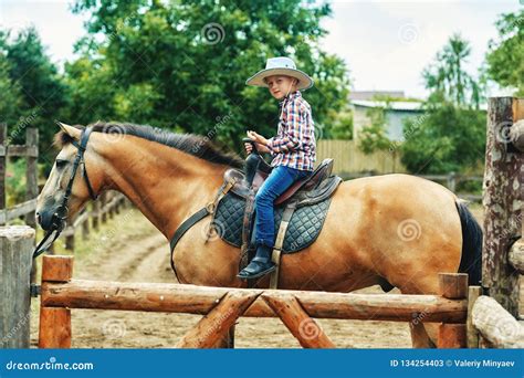 Portrait Of A Boy On A Ranch Child With Horse Stock Image Image Of