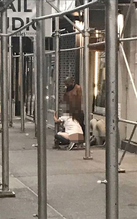 Woman Is Seen Performing A Sex Act On A Man In New York City Street Daily Mail Online