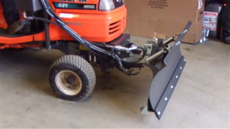 Kerstens Fkdr Attachment System With A Snowplough On A Kubota G21