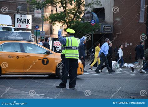nypd cop directing traffic in nyc editorial photo 14508019