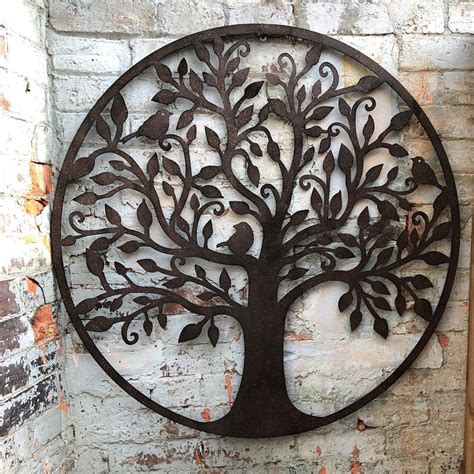 A Metal Tree Of Life Wall Hanging For The Garden But Also Looks Great