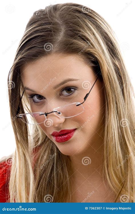 Woman Posing In Red And Wearing Eyeglasses Royalty Free Stock