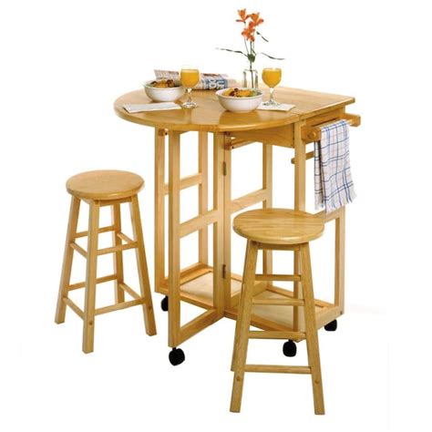 Winsome Wood Brown Farmhouse Kitchen Cart With 2 Stools In The Kitchen