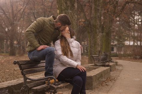 Young Couple Sitting Park Bench Kiss High Quality People Images
