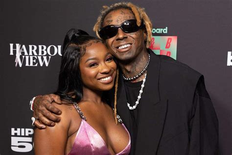 Reginae Carter Reflects On How Dad Lil Wayne Taught Her To Have Thick