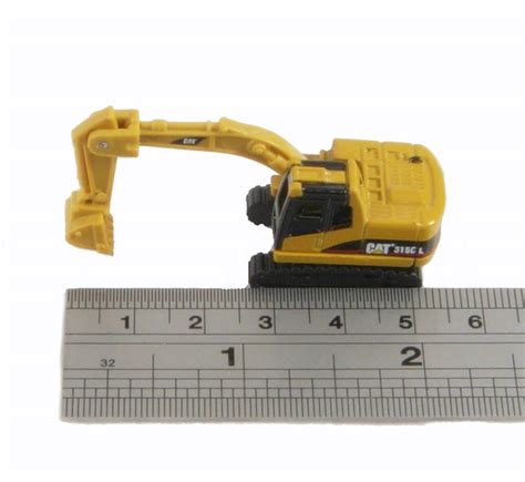 This cat m315 mobile digger is produced in germany in 2000. hattons.co.uk - Norscot Scale Models N55420 Cat 315 excavator