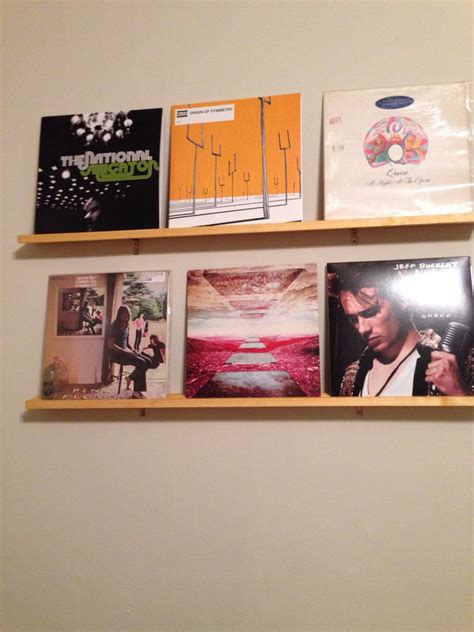 Display Record Albums Use Crown Molding As A Grooved Shelf Design
