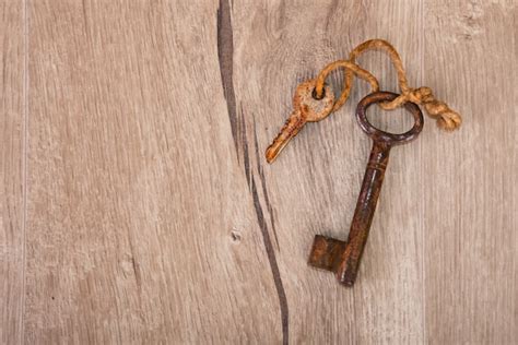 Premium Photo Old Rusty Keys On Wood