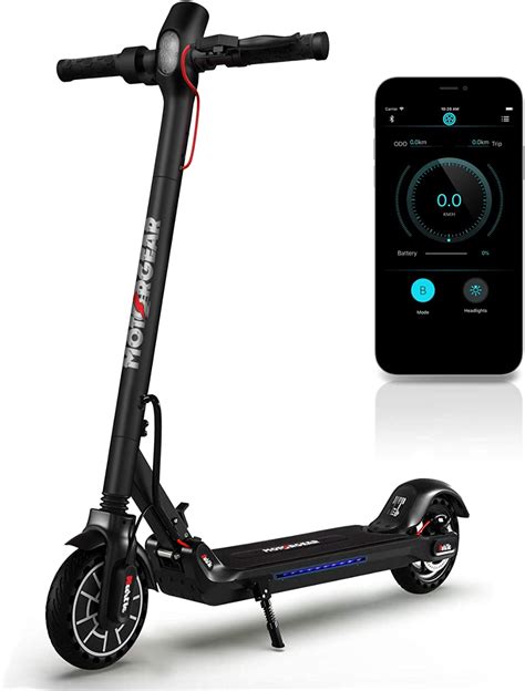 An Electric Scooter Is Shown With The Remote Control On Its Side