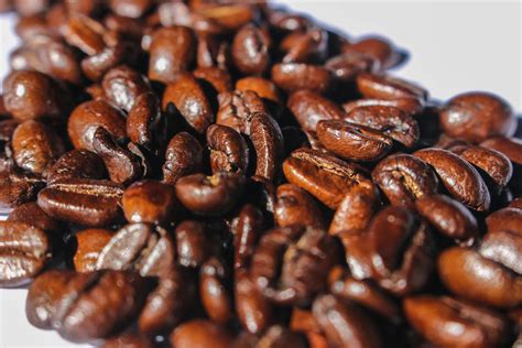 Close Up Photography Of Roasted Coffee Beans · Free Stock Photo