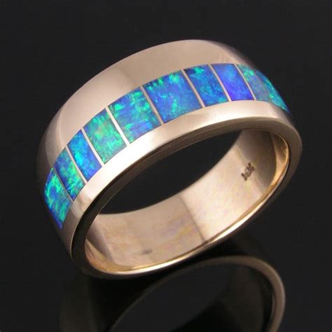 A classic 18 carat gold wedding ring will cost approximately $800 for a lady or the same design for a gent, will cost approximately $1,300. Australian Opal Wedding Ring in 14k gold by Hileman