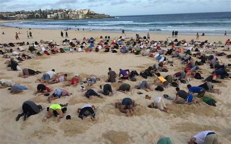 Australians Bury Heads In Sand To Mock Government Climate Stance News