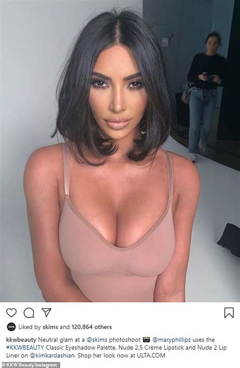 Kim Kardashian Showcases Her Ample Cleavage In Sultry Throwback Snap For KKW