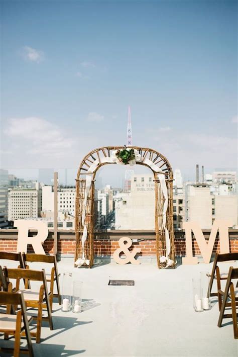 The Perfect Rooftop Wedding Ceremony With A Beautiful City View Photo