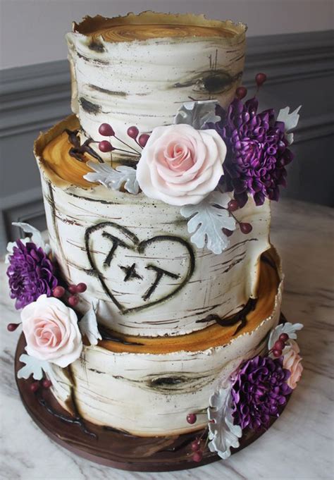 Having lavender as your wedding theme? Three Tier Rustic Pink and Purple Flower Topped Wedding ...