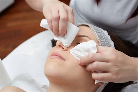 Relaxing Beautiful Woman Having A Massage For Her Skin On A Face In Beauty Salon Stock Image