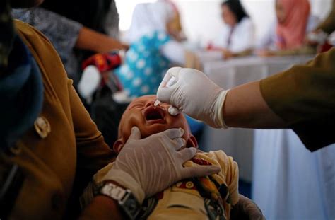 Indonesia Begins Re Vaccinating Victims Of Fake Drug Ring Reuters