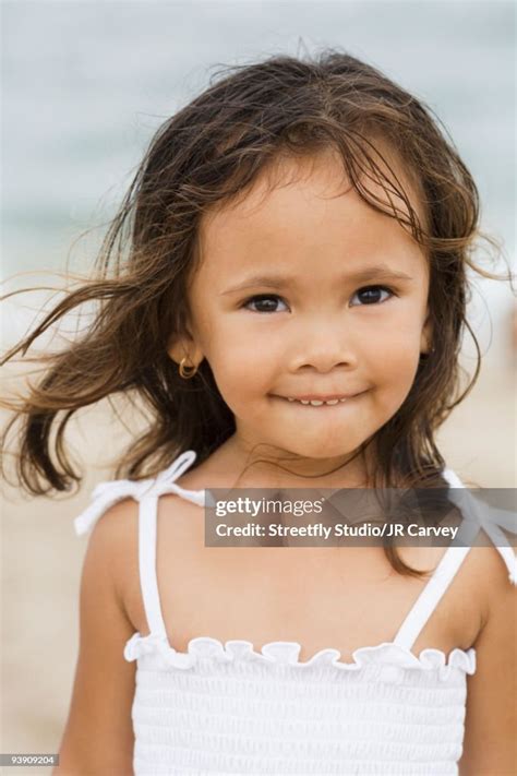 Mixed Race Girl Smiling On Beach High Res Stock Photo Getty Images