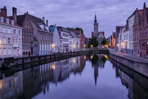 Jan Van Eyckplein Old Town Of Bruges Belgium During Sunset Stock