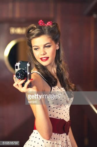 Beautiful Pin Up Girl With Camera Stock Photo Getty Images