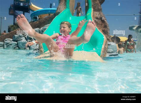 Girl On Water Slide Stock Photo Alamy