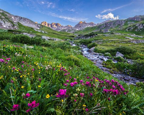 Landscape Beautiful Scenery Rocky Peaks Stream Meadow With Colorful