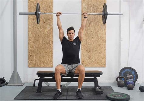 Seated Overhead Barbell Press Tips On Proper Form And Similar Exercises
