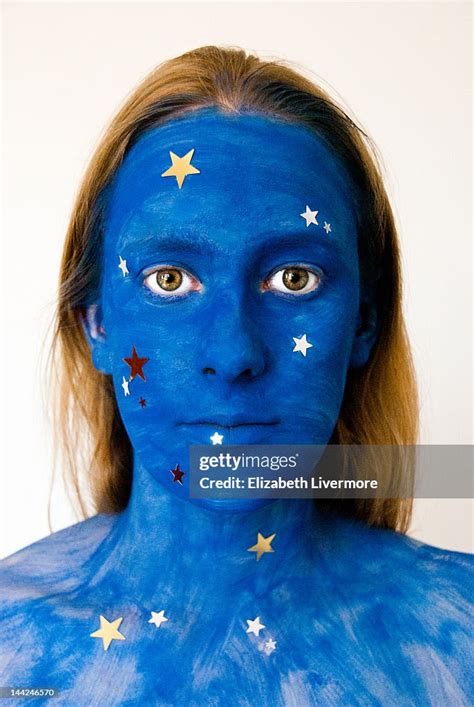 Woman With Bright Blue Facepaint Photo Getty Images