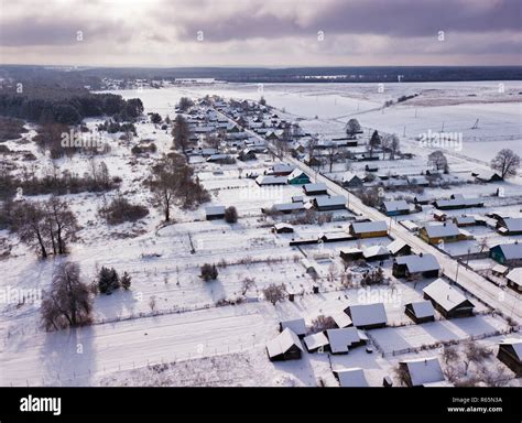 Winter Rural Landscape Aerial View Of Village Houses Meadow And