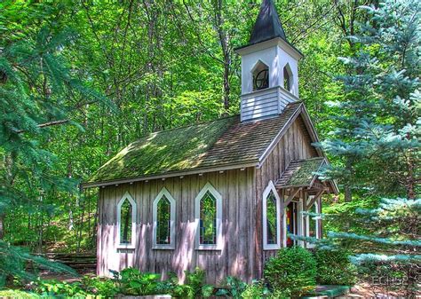 Down The Path Over The Covered Bridge Is The Little Chapel Among The
