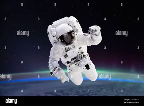 Astronaut Floating In Space Waving Hi Res Stock Photography And Images
