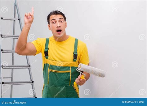 The Man Painting The Wall In Diy Concept Stock Photo Image Of