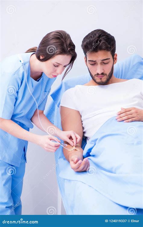 The Woman Doctor Examining Male Patient In Hospital Stock Image Image Of Medical Care 124019337