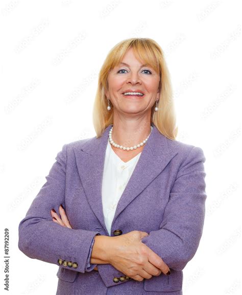 Portrait Of Happy And Smile Aged Senior Woman 60 65 Years With White Teeth In Suit And With Big