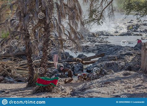 Unidentified Himba Woman Washing Clothes At Epupa Falls Kunene River