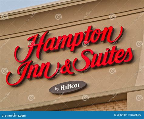 Hampton Inn & Suites Sign Editorial Photo - Image of business