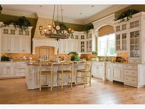 We decided to tile above the kitchen window. like the pot lights in ceiling, valance over sink, i ...
