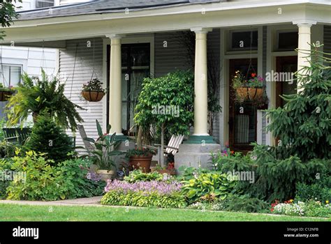 Front Porch Or Veranda Of 19th Century American Home Offers Shady Spot