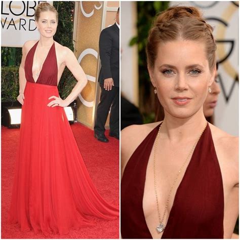An Image Of A Woman In A Red Dress At The Golden Globe Awards Wearing A