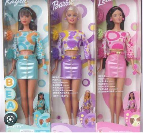 Two Barbie Dolls In The Same Box One Is Wearing A Skirt And The Other