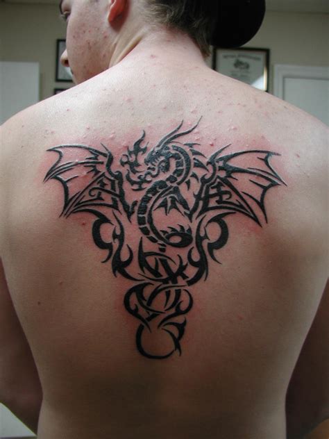 It is a fun way to make a simple design more complex, but to also keep its original meanings in place. 22 Beautiful Tribal Dragon Tattoo