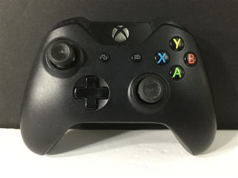 2 Black Xbox One Controllers