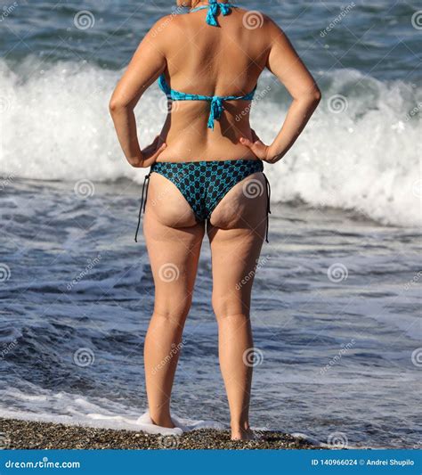 Booty Girl In A Swimsuit On The Beach Of The Sea Stock Photo Image Of