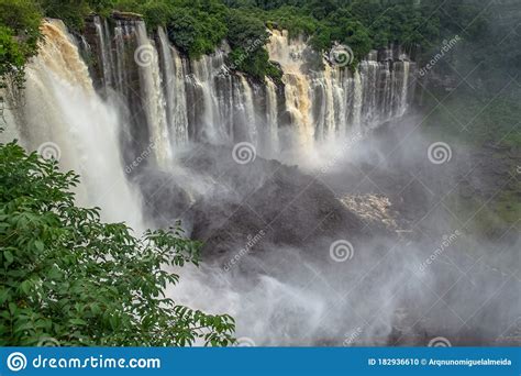 View Of The Kalandula Waterfalls On Lucala River Tropical Forest And