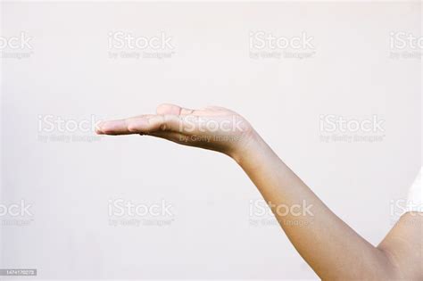 Woman Extending Her Hand In Front Stock Photo Download Image Now