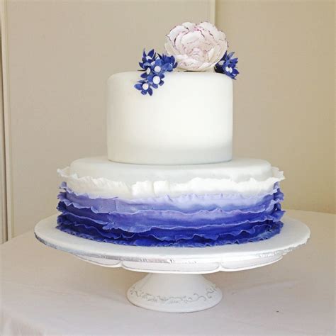 White wedding cake with lilac, lavender, purple roses ombre #lavenderweddings #weddingcakes. Violet Ombré Effect Ruffle Wedding Cake - CakeCentral.com