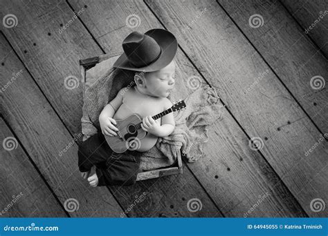 Newborn Baby Cowboy Playing A Tiny Guitar Stock Image Image Of