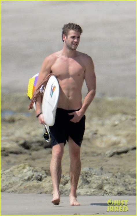 Full Sized Photo Of Chris Liam Hemsworth Shirtless Surfing Duo 18